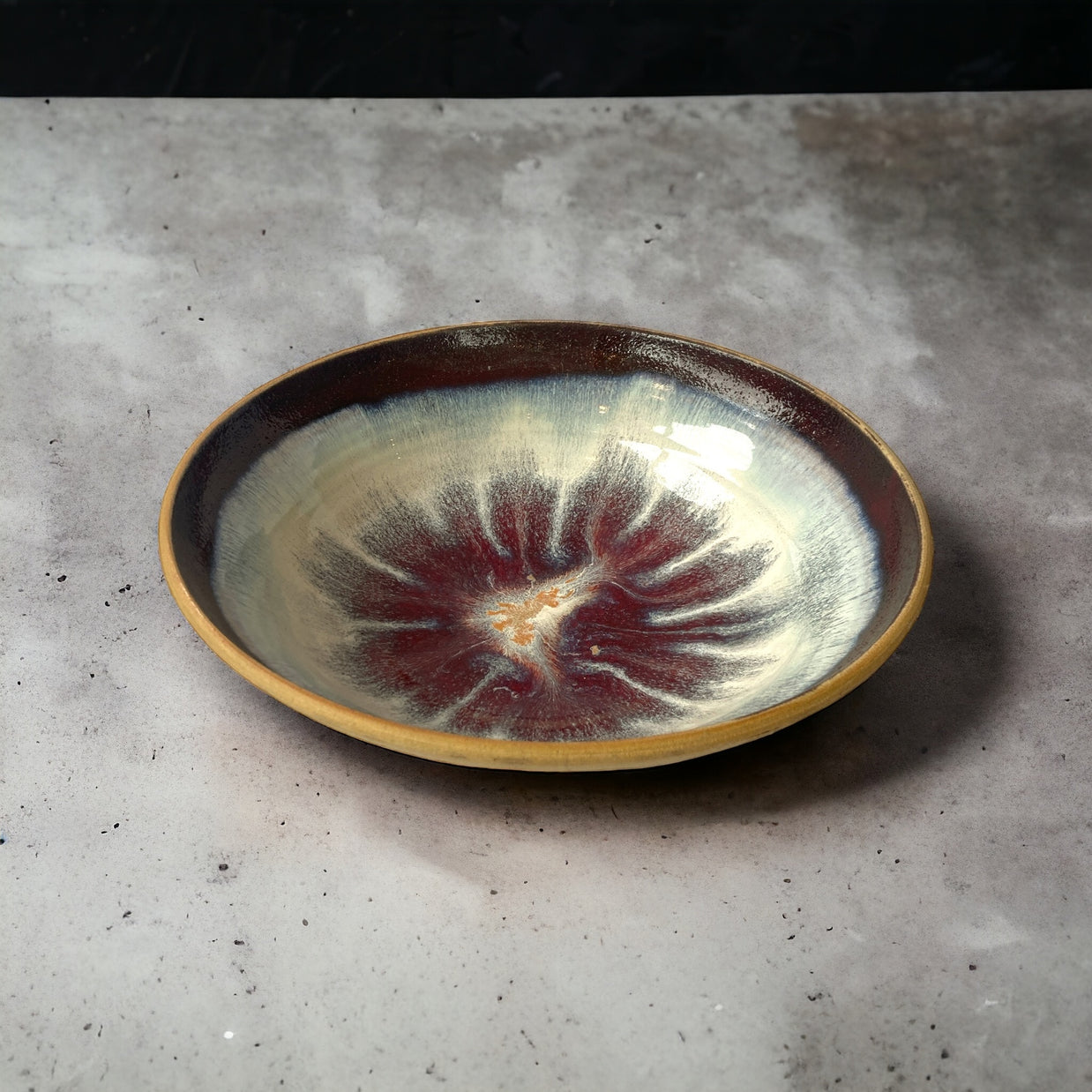 Medium-sized ceramic bowl in beige burgundy - white shades.