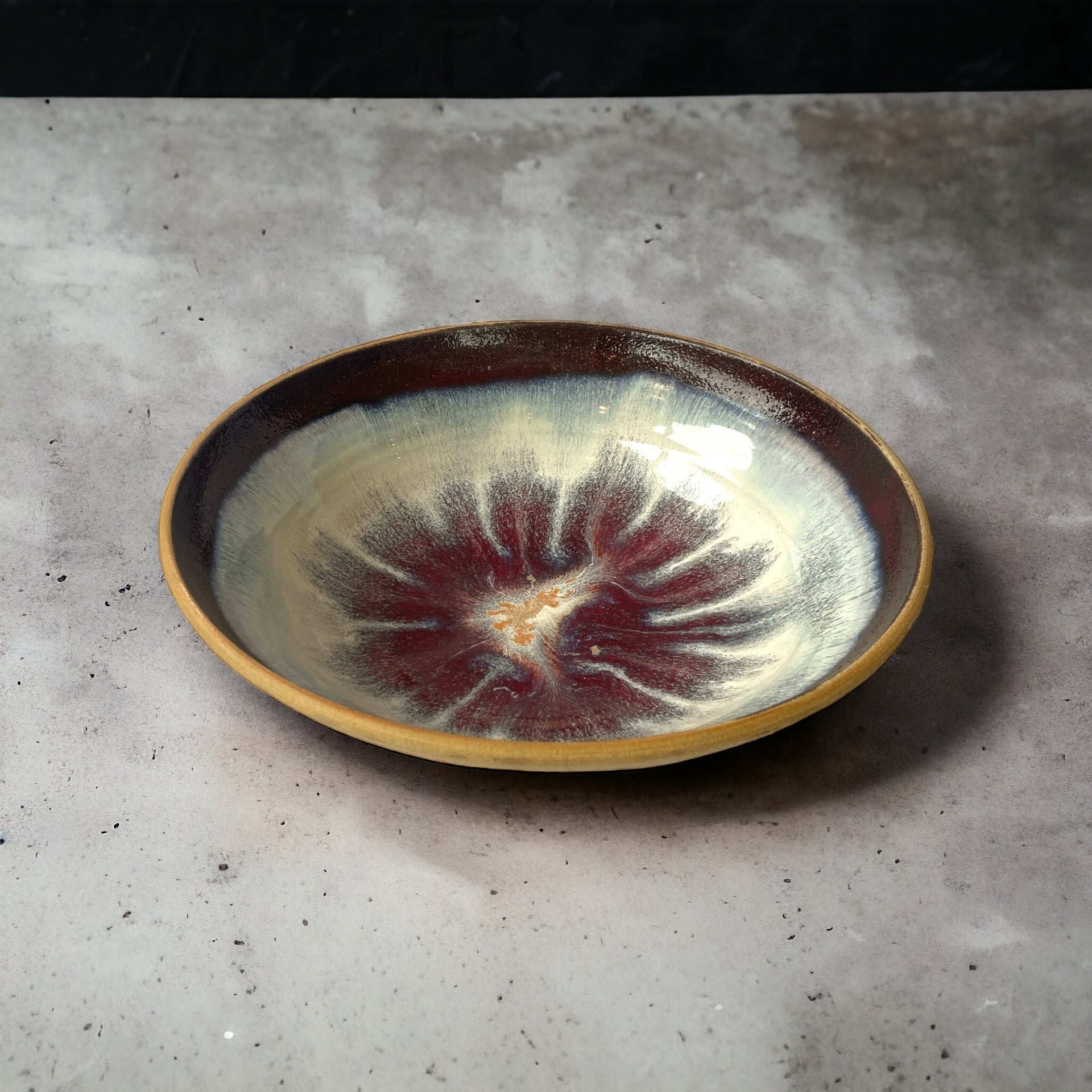 Medium-sized ceramic bowl in beige burgundy - white shades.