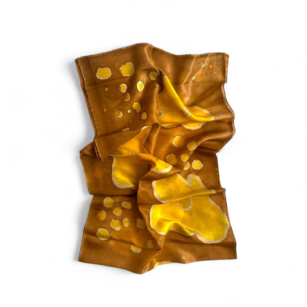 Magis Art Shop hand-painted brown and yellow 100% silk scarf with abstract circular patterns and artist signature.