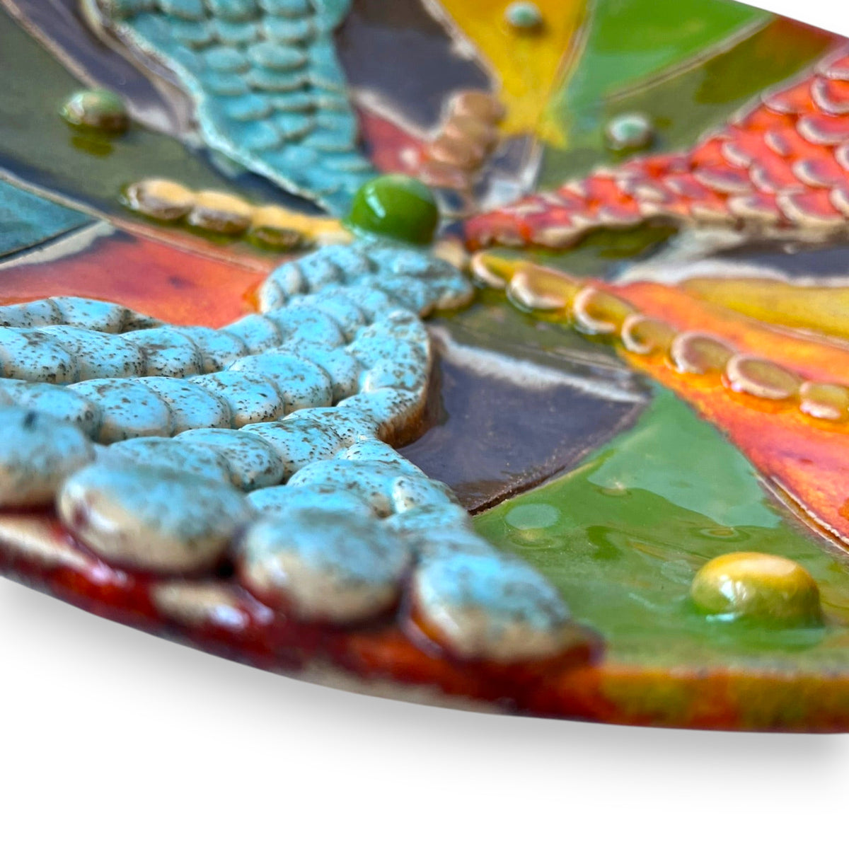 Magis Art Shop ceramic bowl by Janka Blašková featuring textured autumn-colored glaze and decorative clay spheres.