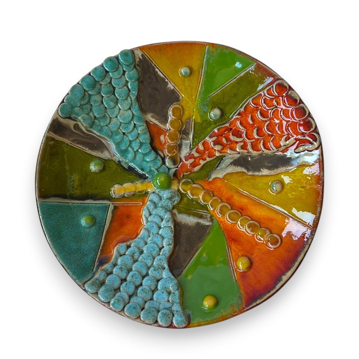 Magis Art Shop ceramic bowl by Janka Blašková featuring autumn-colored geometric segments and decorative bead details.
