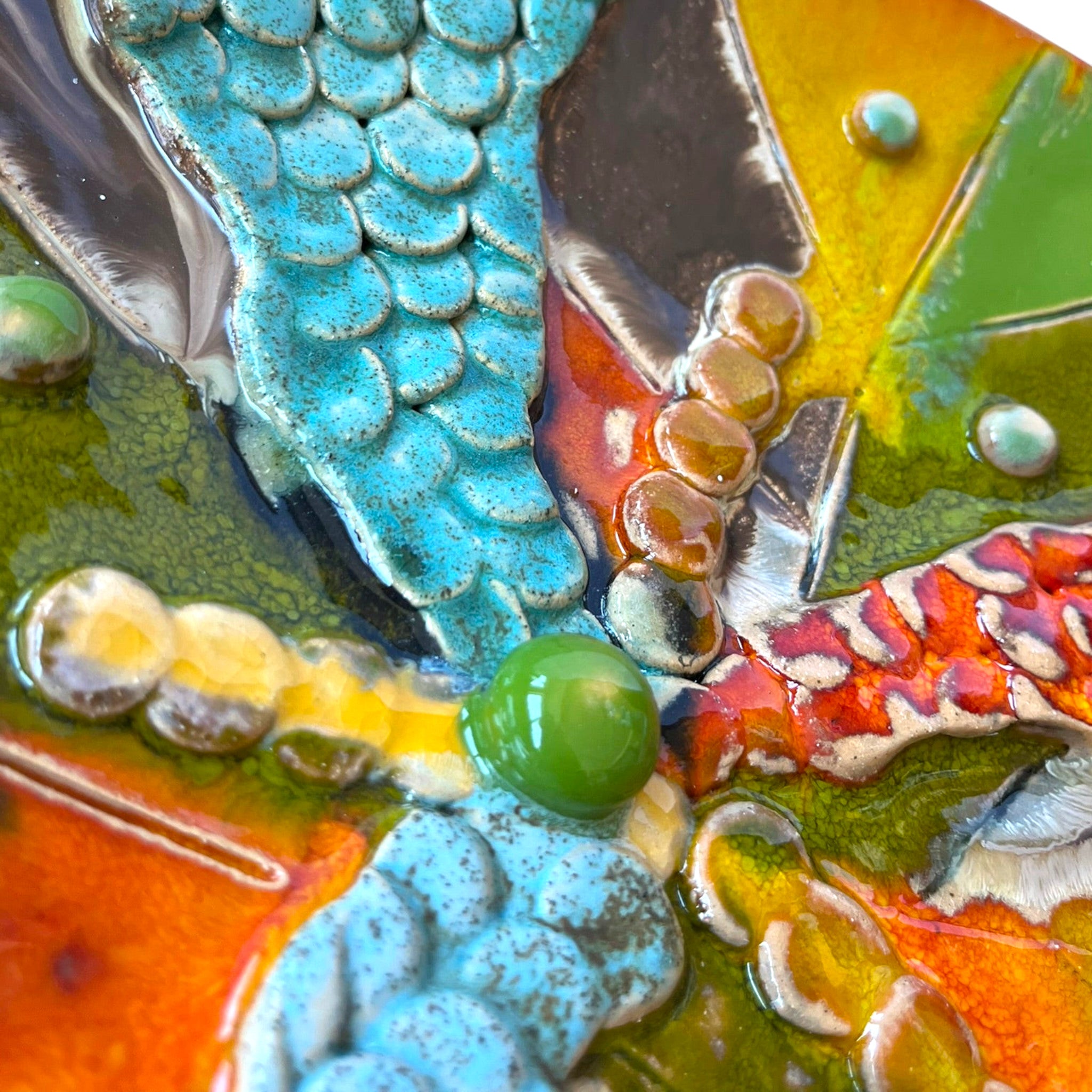 Magis Art Shop ceramic bowl by Janka Blašková featuring autumn-colored glaze, textured scales, and decorative beads.