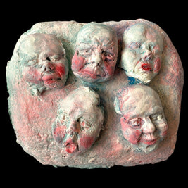 Magis Art Shop clay sculpture Tváre II by Róbert Szittay featuring five expressive faces in pink and teal tones.