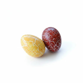 Magis Art Shop decorative duck eggs with a yellow and red crackled paint finish on a white background