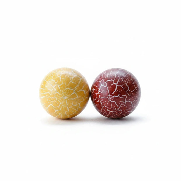 Magis Art Shop decorative duck eggs with a unique cracked paint finish in yellow and dark red