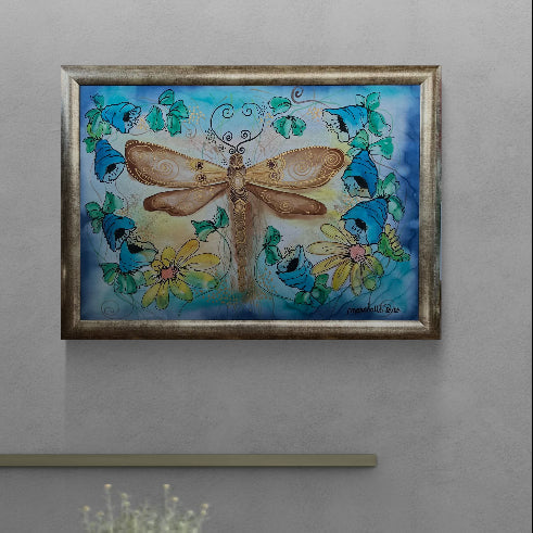Magis Art Shop silk painting by Elena Ruta featuring a golden dragonfly surrounded by blue bells and yellow daisies.