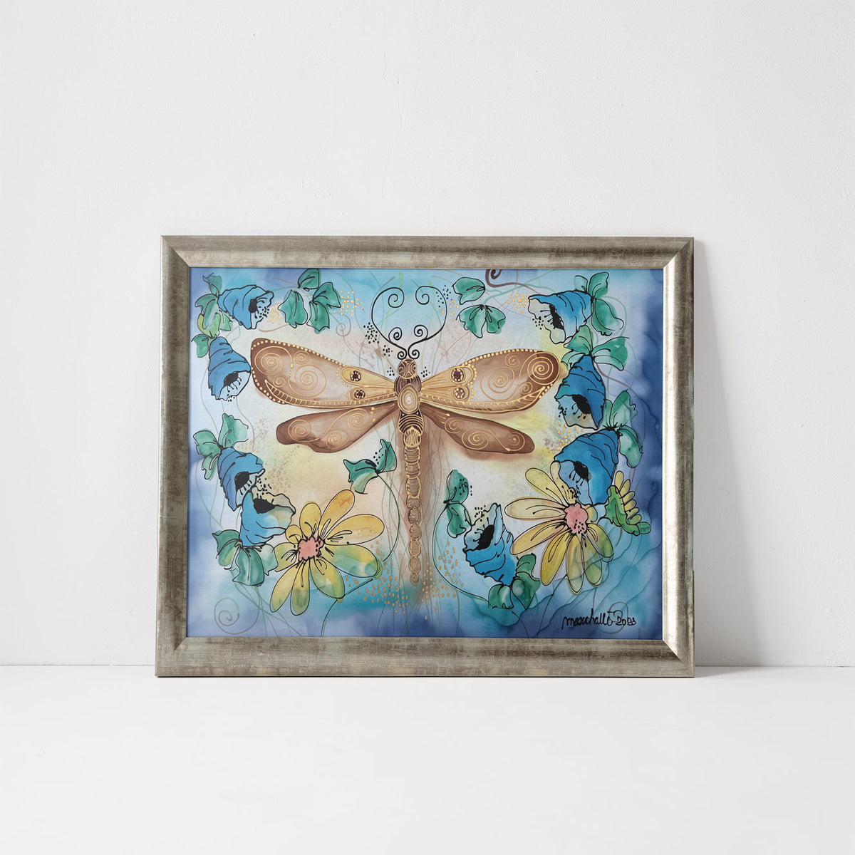 Magis Art Shop silk painting featuring a golden dragonfly surrounded by blue bellflowers and yellow daisies in a frame
