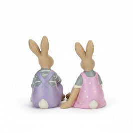 Magis Art Shop pair of small ceramic Easter bunny figurines in purple overalls and a pink polka dot dress