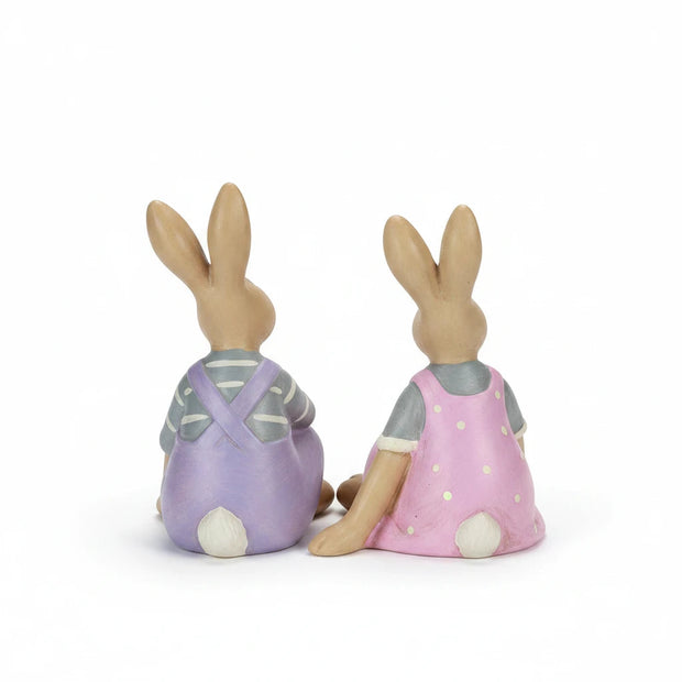 Magis Art Shop pair of small ceramic Easter bunny figurines in purple overalls and a pink polka dot dress