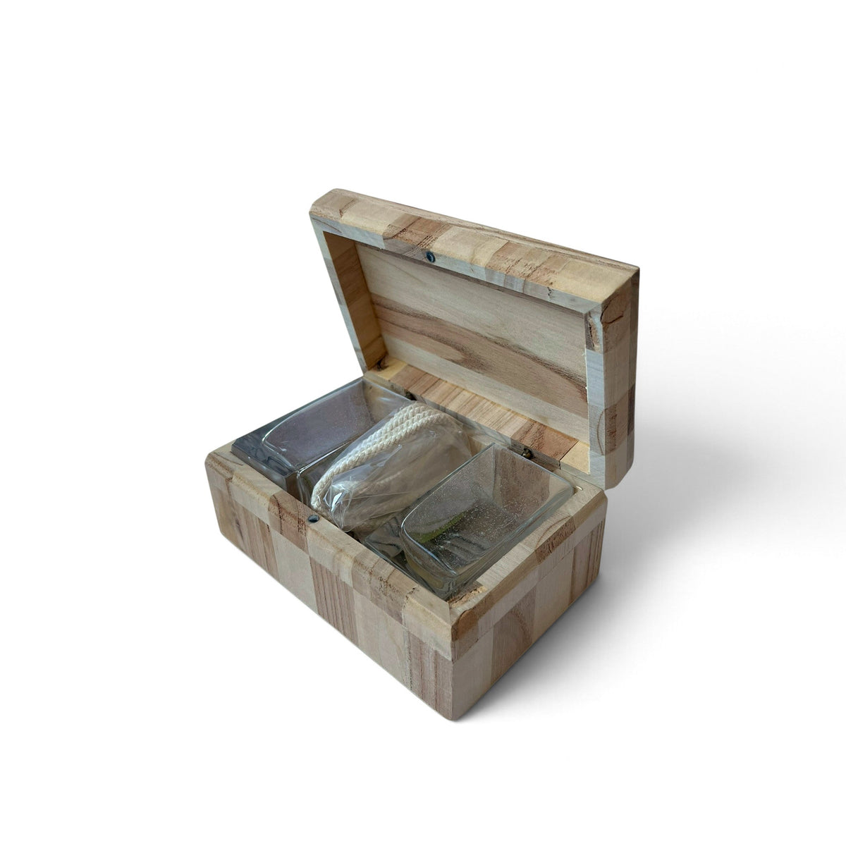 Magis Art Shop glass oil lamps with metal tubes and wicks stored in a decorative wooden box for cozy home lighting.