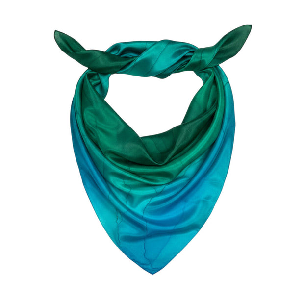 Magis Art Shop Elena Ruta silk scarf in green and blue gradient with a soft sheen finish