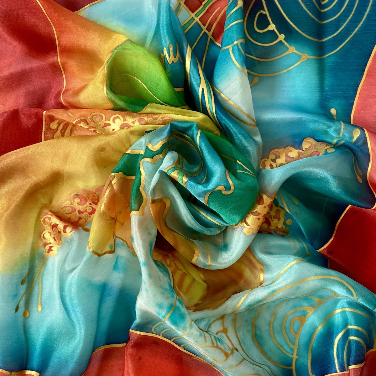 Magis Art Shop hand-painted natural silk scarf with vibrant rainbow colors and gold abstract line patterns