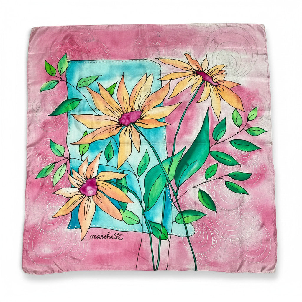 Magis Art Shop hand-painted silk scarf featuring yellow flowers on a pink and blue background