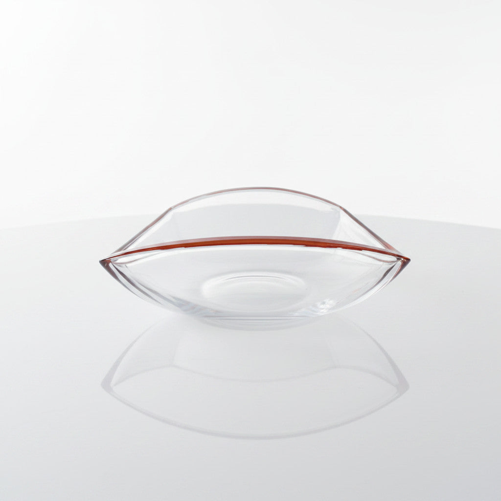 Magis Art Shop large clear glass bowl with a vibrant orange rim, elegant oval shape for fruit or decor