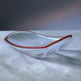 Magis Art Shop large clear glass bowl with a vibrant orange rim, elegant organic shape for fruit or decor.