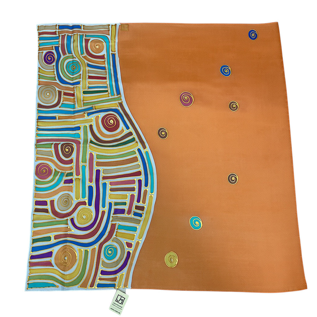 Magis Art Shop hand-painted orange silk scarf by Jana Melichová featuring geometric patterns and spiral motifs