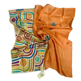 Magis Art Shop hand-painted orange silk scarf by Jana Melichová featuring colorful geometric spiral patterns