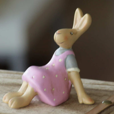 Magis Art Shop small pink ceramic Easter bunny figurine wearing a polka dot dress, 11 cm tall.
