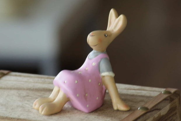 Magis Art Shop small pink ceramic Easter bunny figurine wearing a polka dot dress, 11 cm tall.