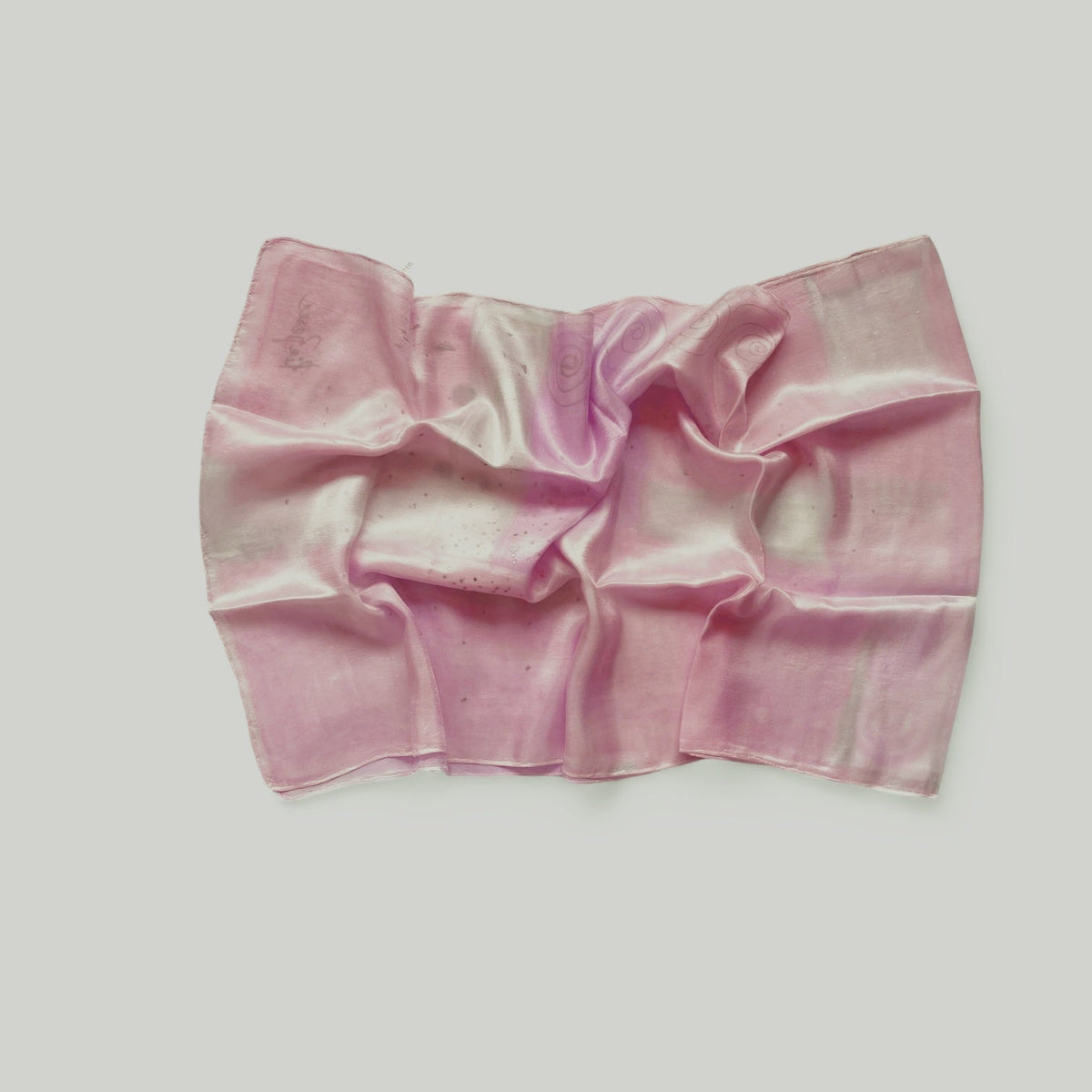 Magis Art Shop hand-painted pink silk scarf by Ria Berec with artistic patterns and a glossy finish.