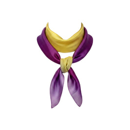 Magis Art Shop hand-painted purple and yellow silk scarf with a soft sheen, tied in a classic knot style.