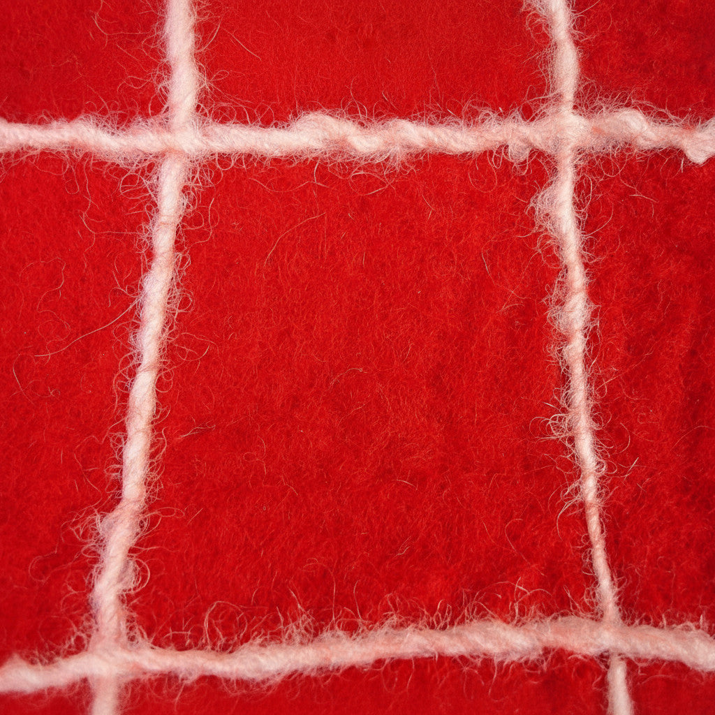 Magis Art Shop Gry and Sif handmade red felt wallet with a white grid pattern texture close-up