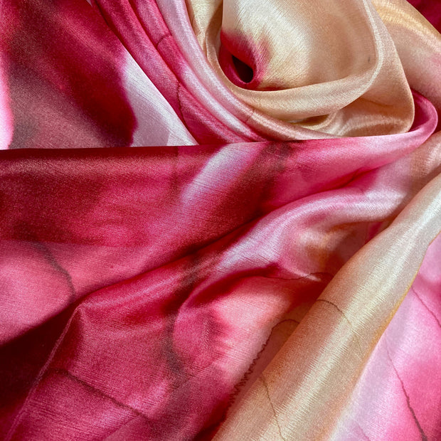 Magis Art Shop Elena Ruta Marchallé red silk scarf with a soft, flowing tie-dye pattern and lustrous finish.