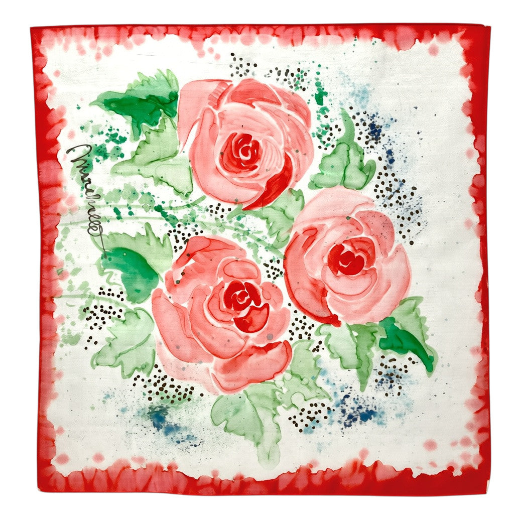 Magis Art Shop silk scarf featuring a hand-painted rose floral pattern in red, pink, and green on a white background.