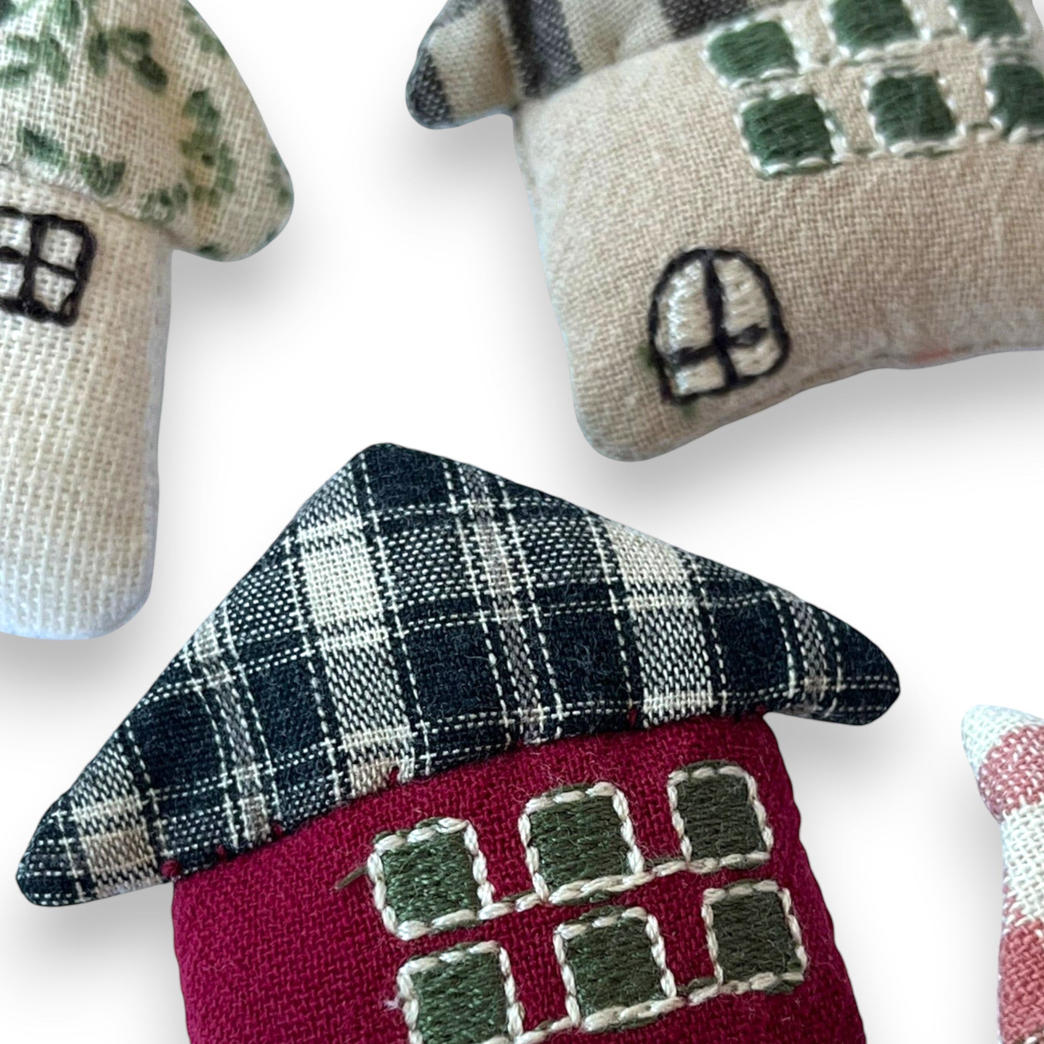 Magis Art Shop textile house brooch with embroidered windows and a plaid roof pattern
