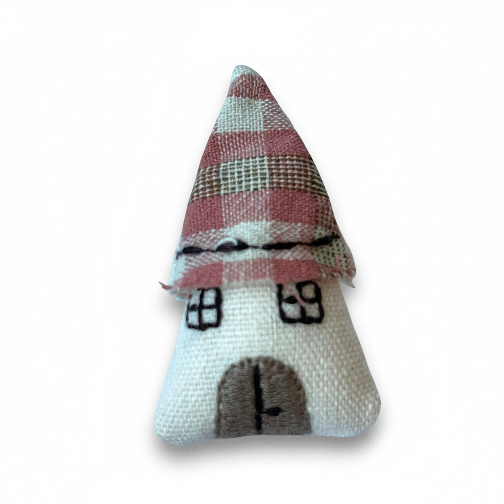 Magis Art Shop textile house brooch with a pink plaid roof and embroidered door and windows
