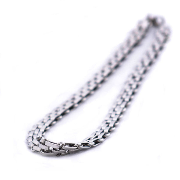 Magis Art Shop elegant triple-strand stainless steel necklace with a polished silver finish