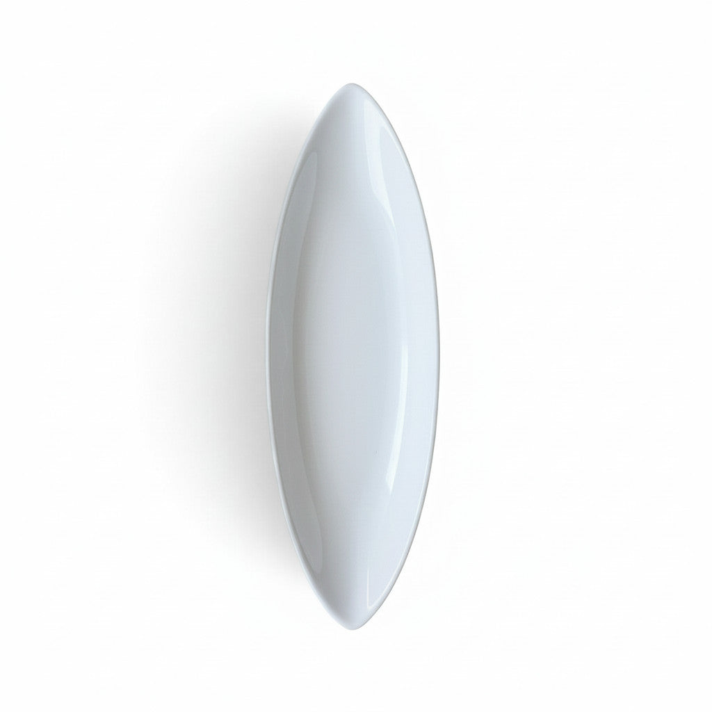 Magis Art Shop white ceramic boat-shaped serving bowl, 26x8 cm, minimalist design for elegant table presentation.