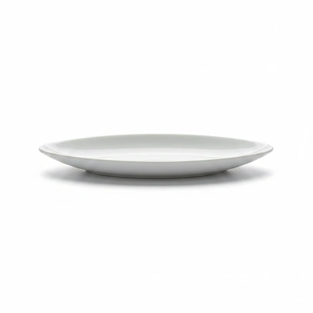 Magis Art Shop white ceramic boat-shaped serving bowl with a shallow design on a clean white background