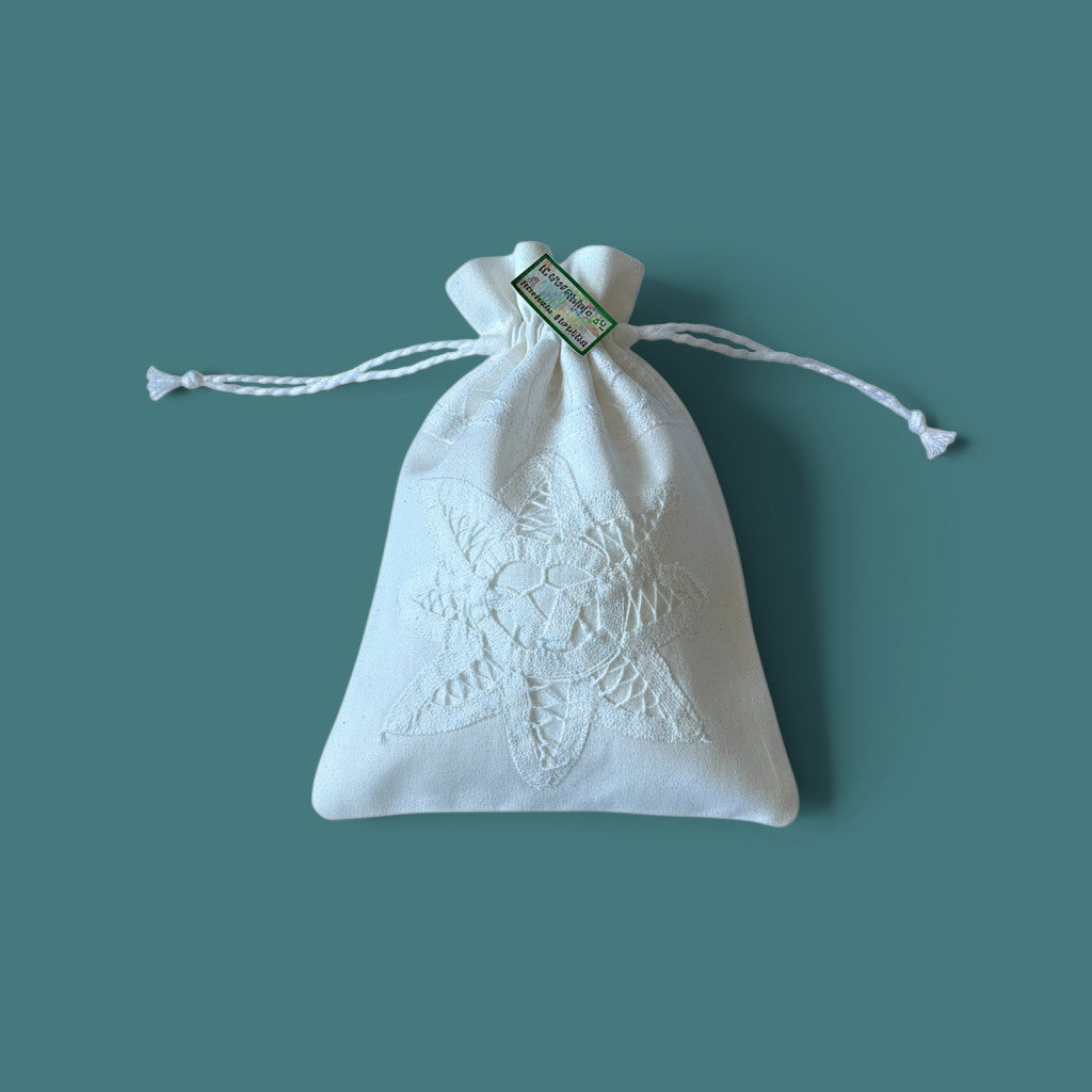 Magis Art Shop white cotton drawstring pouch with delicate floral embroidery for herbs or small gifts