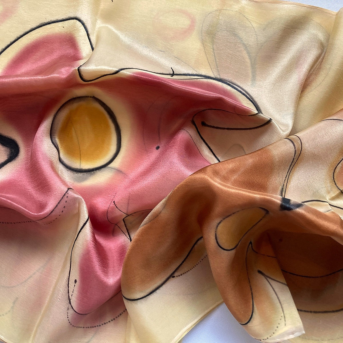 Magis Art Shop hand-painted yellow silk scarf with large pink and brown floral patterns and black contour lines