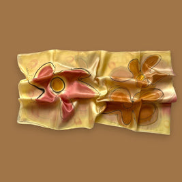 Magis Art Shop hand-painted yellow silk scarf by Ria Berec featuring large floral patterns and artistic contours